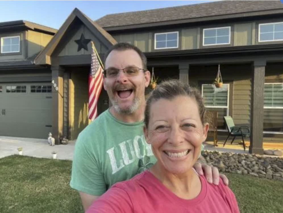 picture of Ashley G. in front of a house