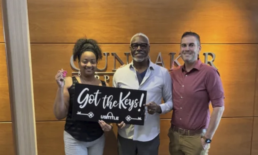 picture of Andy A. in front of a house