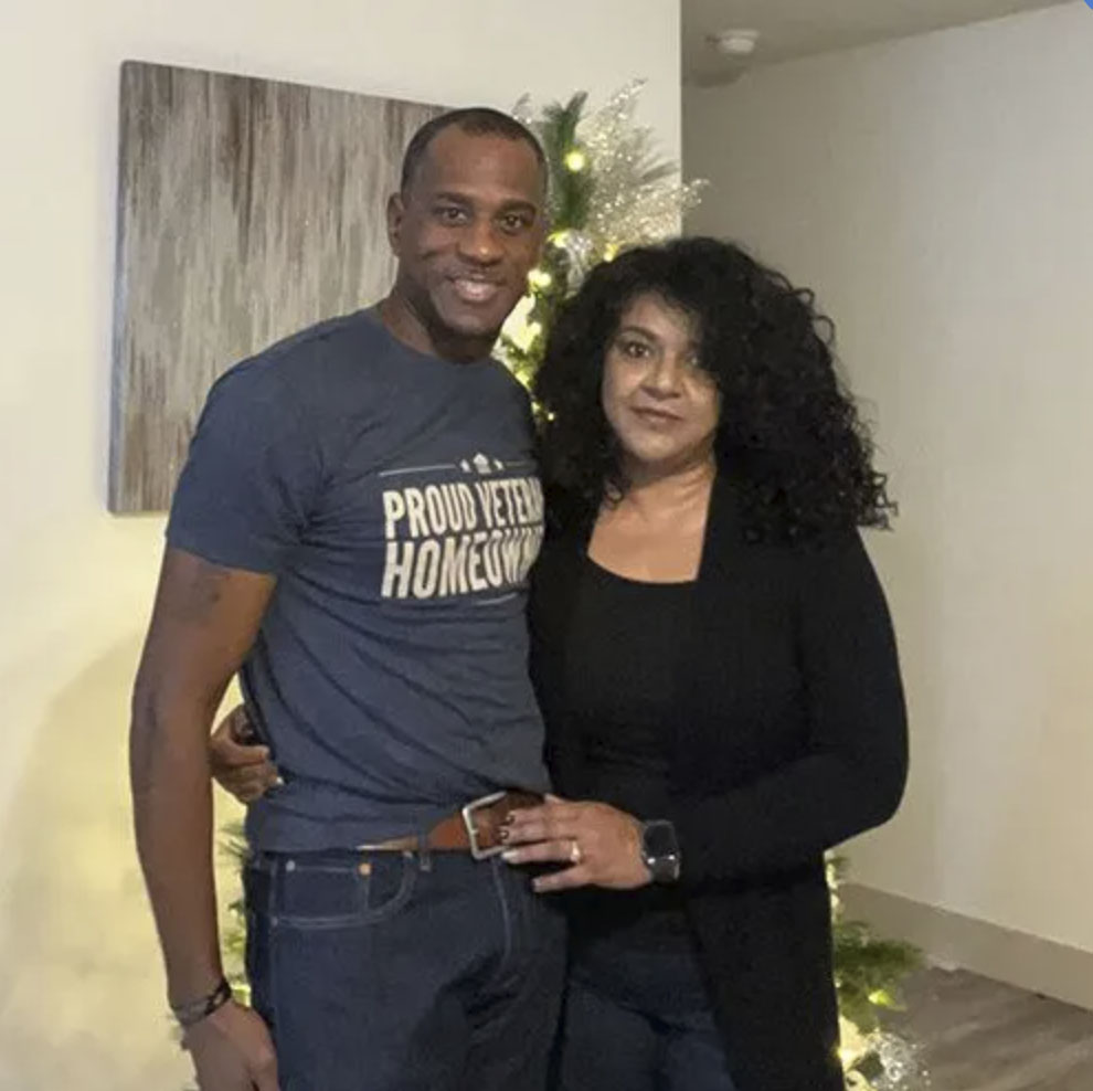 picture of Nathan T. in front of a house